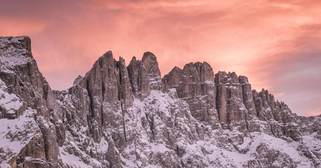 Red sky sunset at the Dolomites in winter