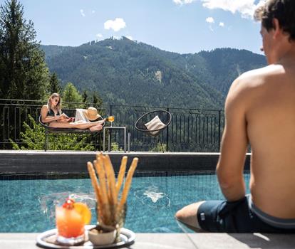 Wellness on the pool side | Hotel Paradies