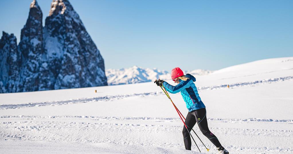 A female cross-country skiing