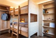 Camera da letto con letto a castello Studio Alpin